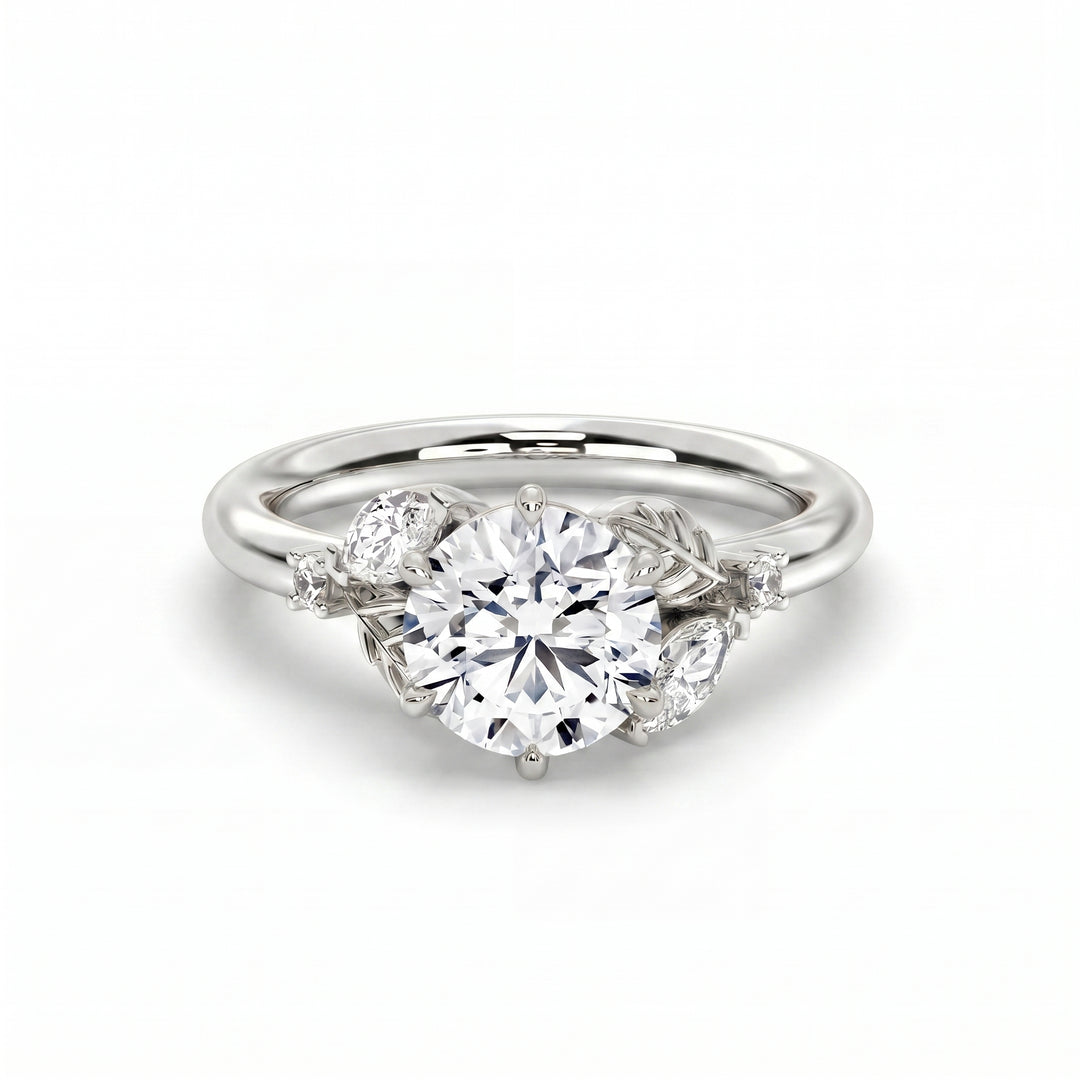 Blossom Setting in 14K White Gold with round-cut center stone and sculpted leaf accents