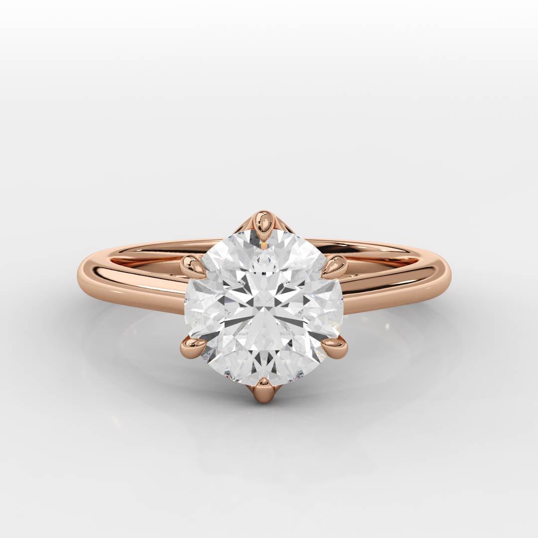 Tapered Cathedral Setting engagement ring with rose gold band and round brilliant diamond solitaire