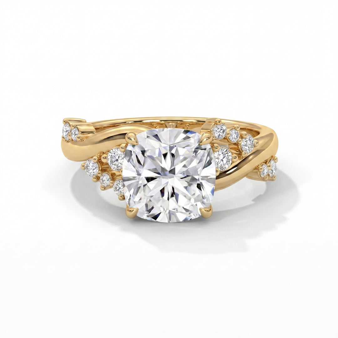 Eden Setting in 14K Yellow Gold with cushion-cut center stone and scattered diamond twisted band