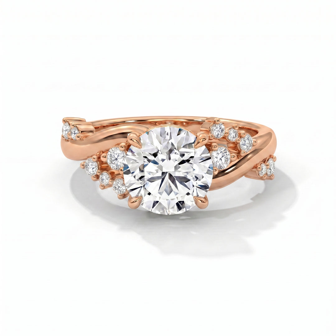 Eden Setting in 14K Rose Gold with round-cut center stone and scattered diamond twisted band