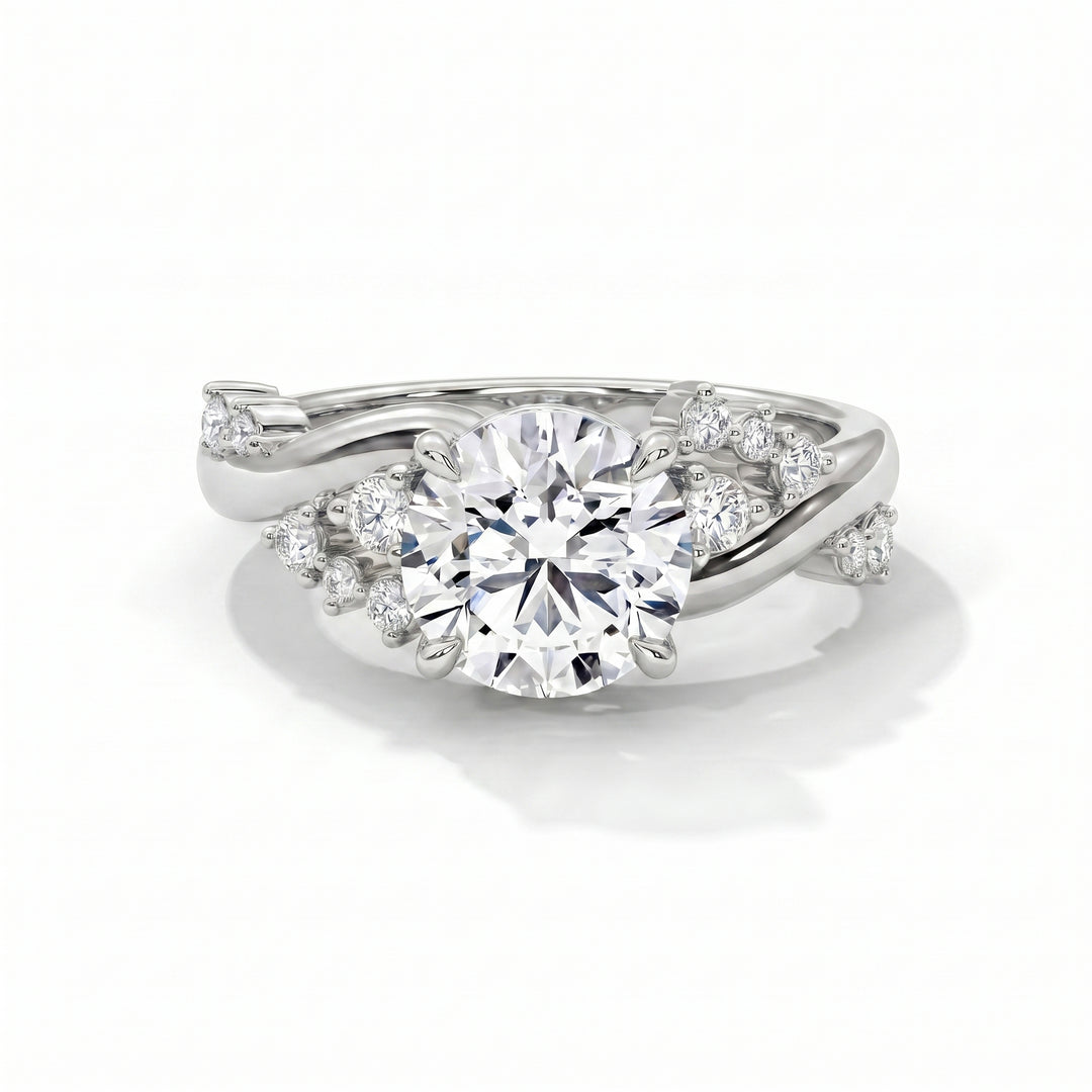 Eden Setting in 14K White Gold with round-cut center stone and scattered diamond twisted band