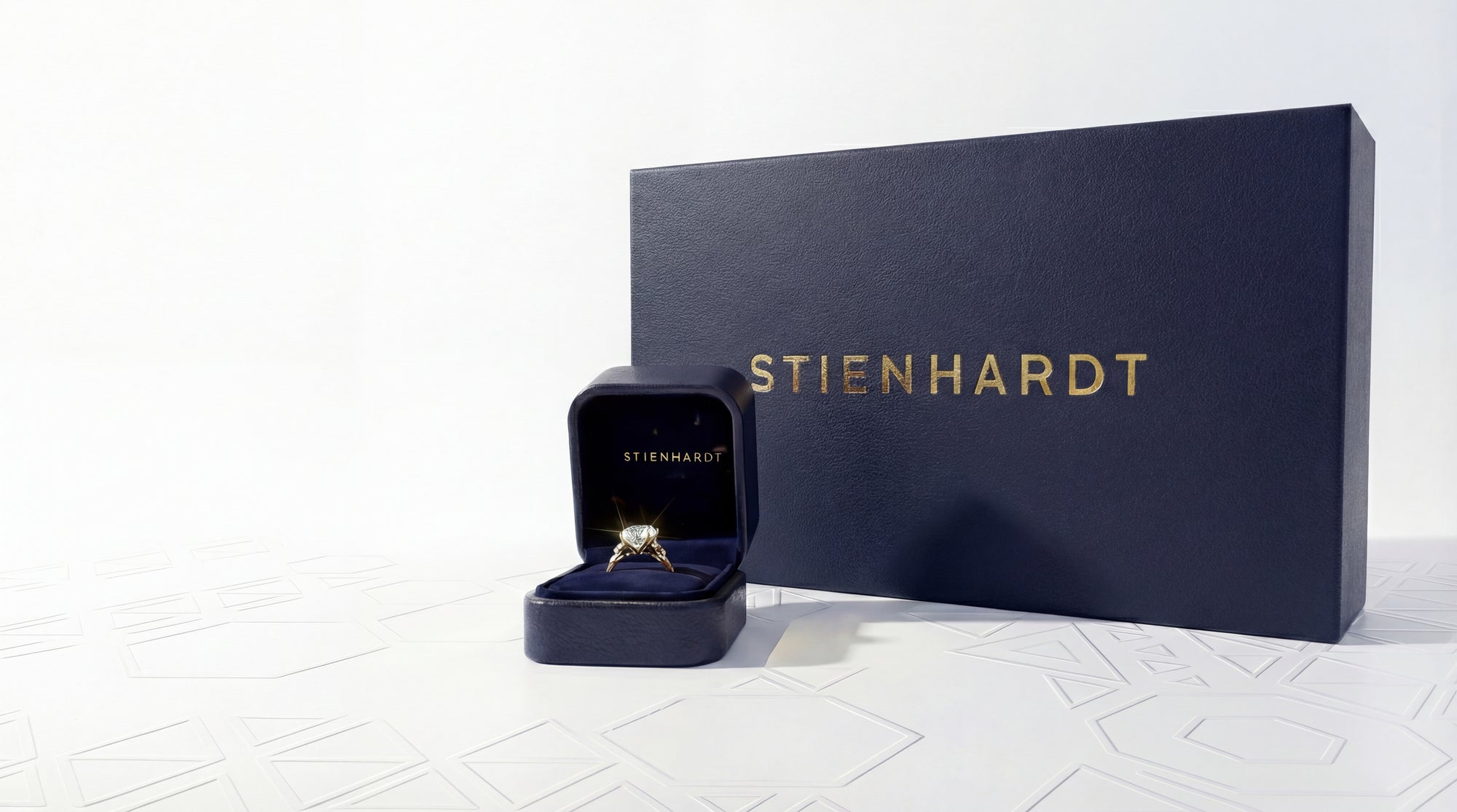 Stienhardt jewelry box with a ring on a white background