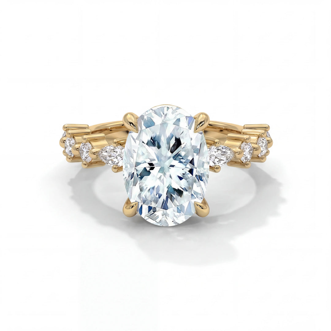 Gold ring with a large diamond and smaller diamonds on the band against a white background