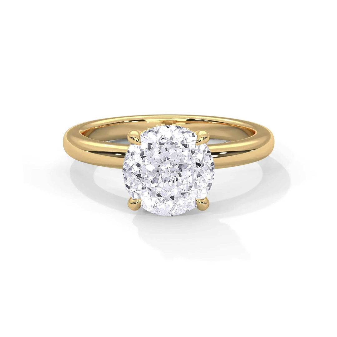 Close-up of a gold engagement ring featuring a large round center diamond with the Venetian Hidden Halo Setting design.