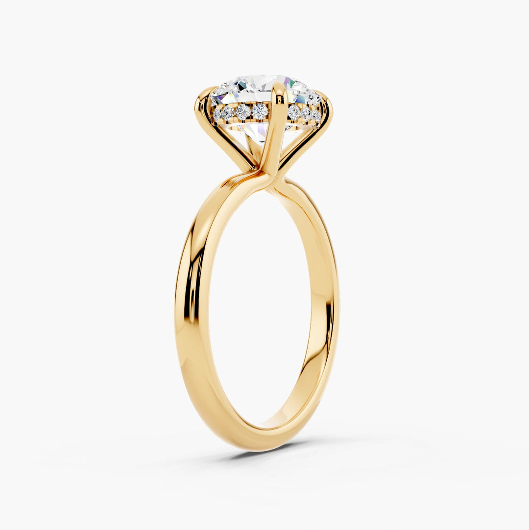 Round yellow gold setting, angled view