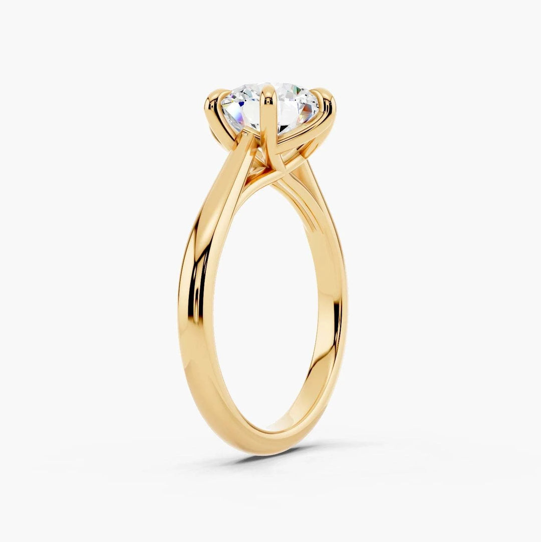 Round yellow gold setting, angled view