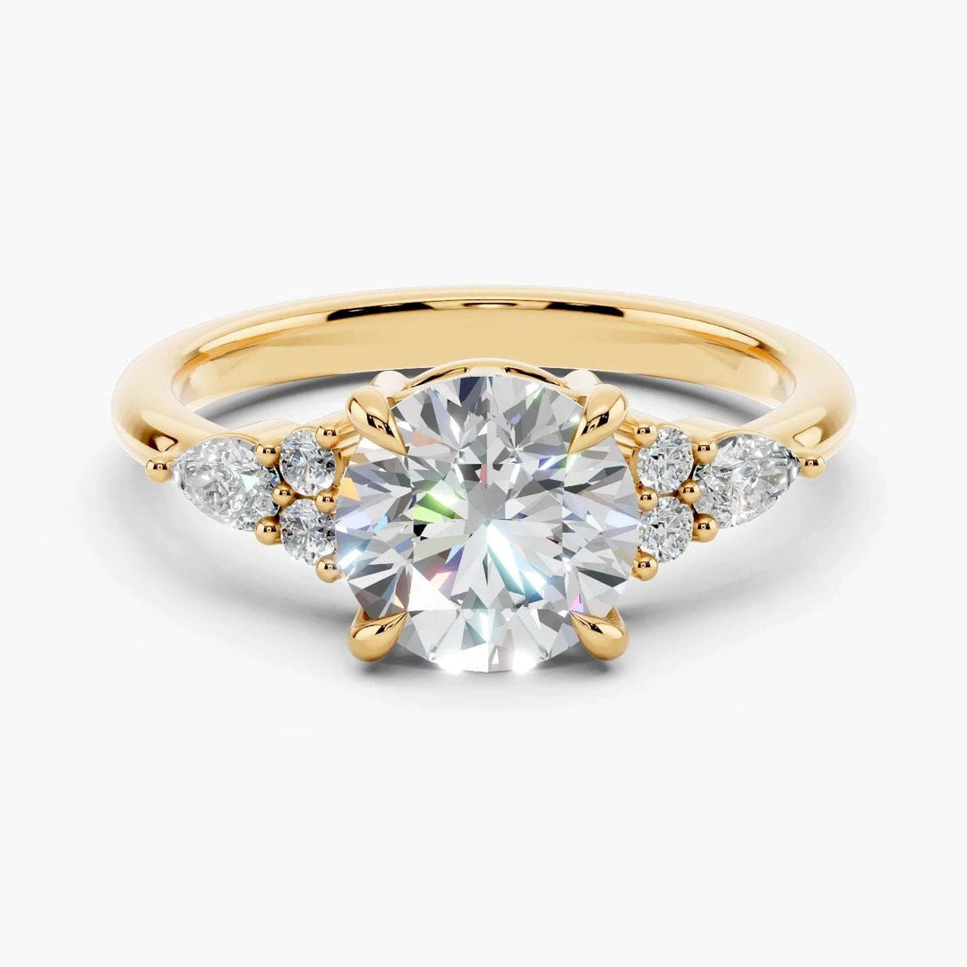 Triana Setting Round cut engagement ring in yellow gold