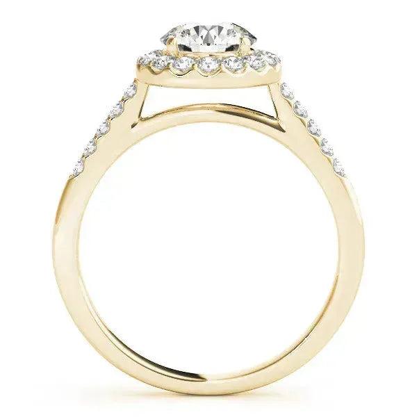 The Bellon Halo Setting gold ring with a diamond halo and pave diamonds on the shank
