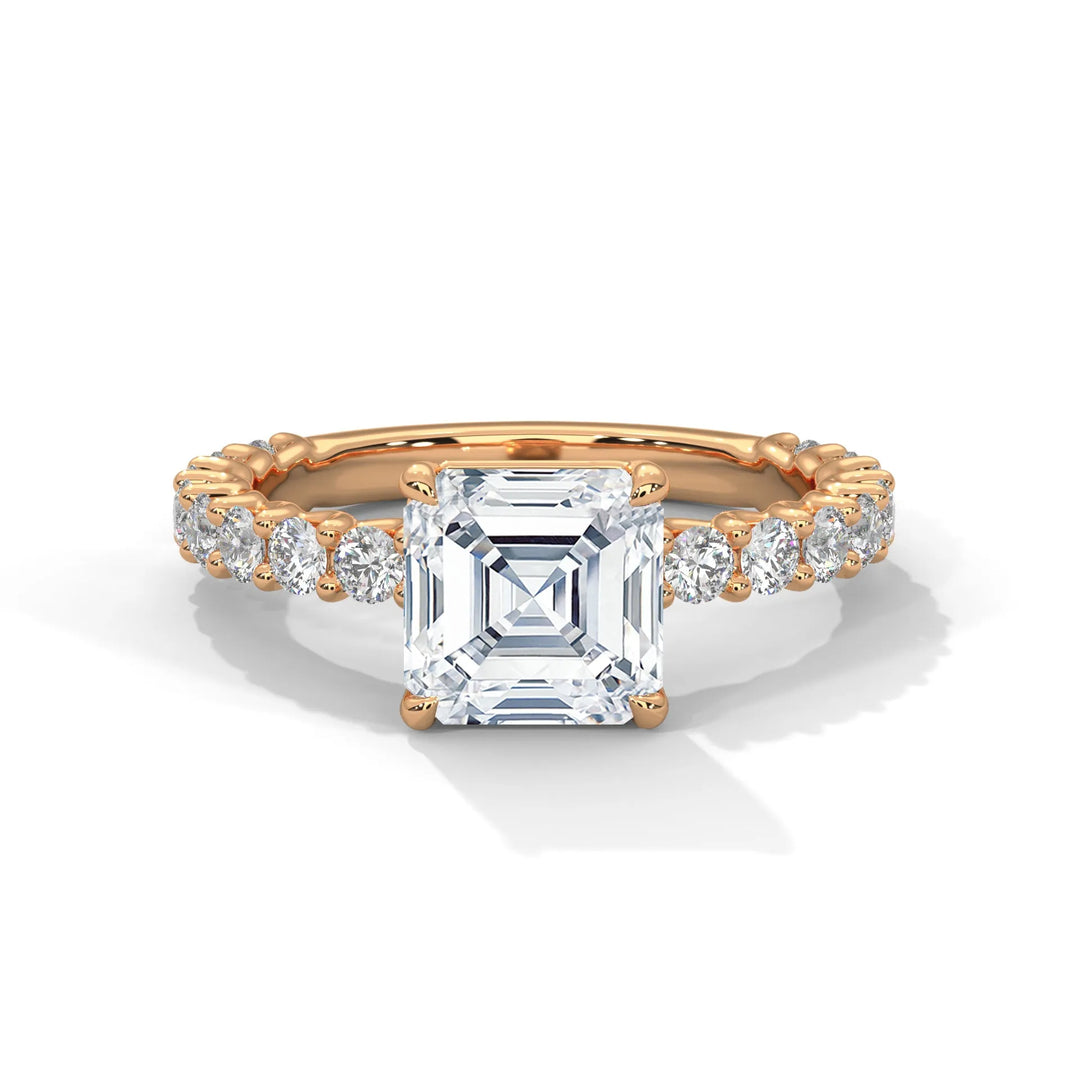 A stunning asscher cut diamond engagement ring in a bubble setting, crafted from 14k rose gold for a luxurious touch.