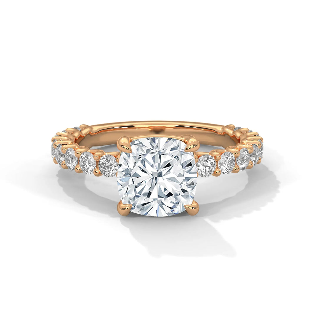 A stunning cushion cut diamond engagement ring in a bubble setting, crafted from 14k rose gold for a luxurious touch.