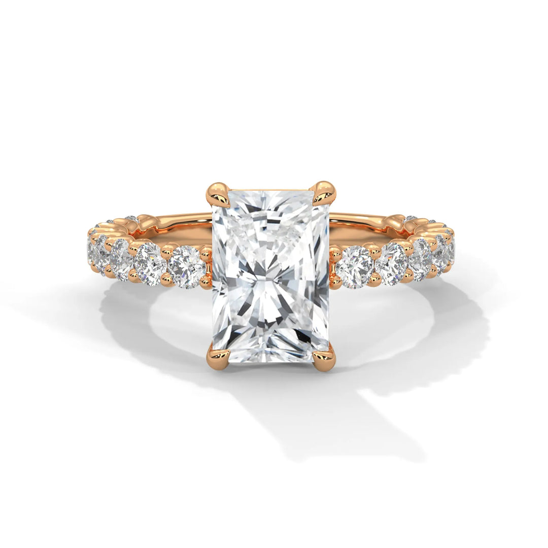 A stunning radiant cut diamond engagement ring in a bubble setting, crafted from 14k rose gold for a luxurious touch.