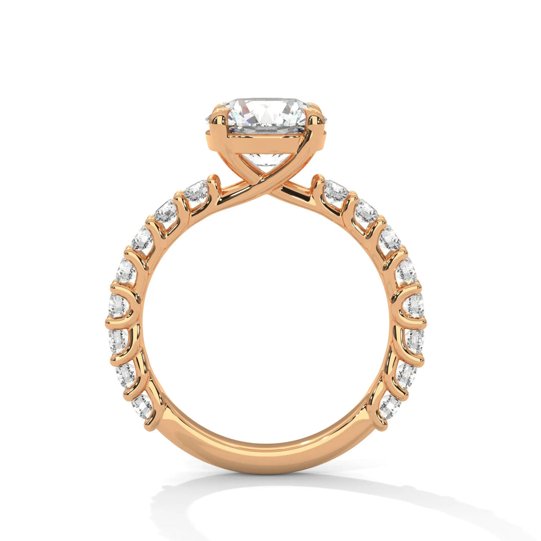 A rose gold engagement ring with a diamond center in a bubble setting, crafted from 14k gold and featuring an round shape.