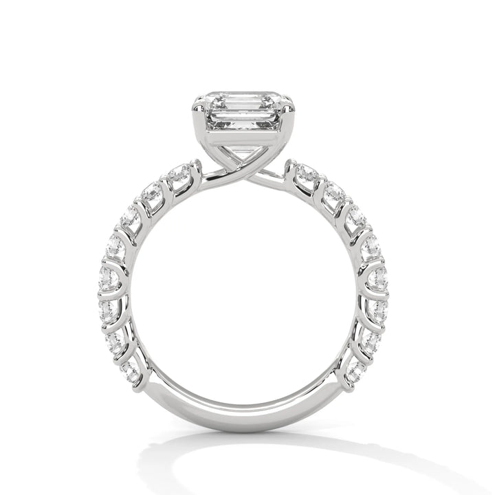 A white gold engagement ring with a diamond center in a bubble setting, crafted from 14k gold and featuring an asscher shape.