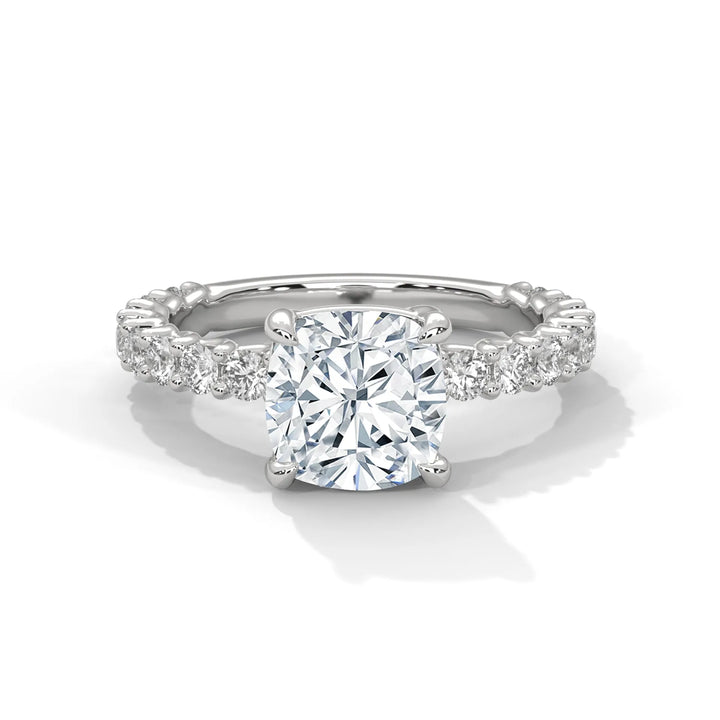 A stunning cushion cut diamond engagement ring in a bubble setting, crafted from 14k white gold for a luxurious touch.