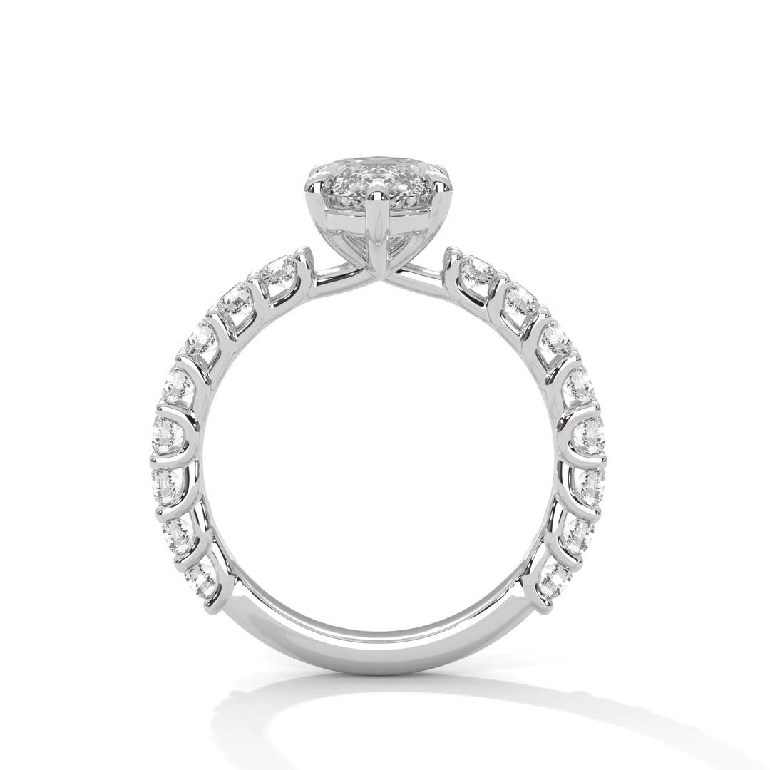 A white gold engagement ring with a diamond center in a bubble setting, crafted from 14k gold and featuring an marquise shape.