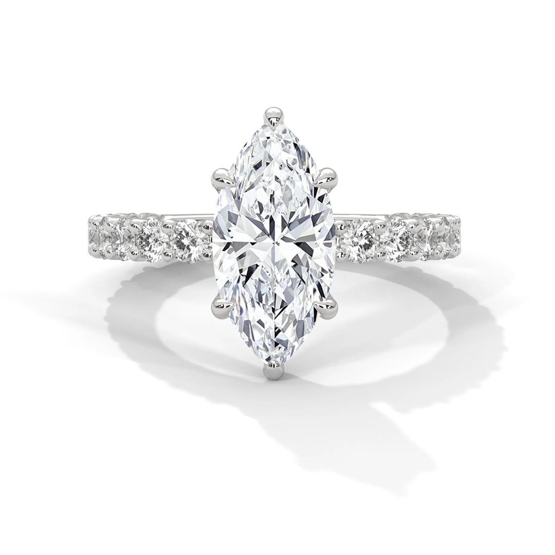 A stunning marquise cut diamond engagement ring in a bubble setting, crafted from 14k white gold for a luxurious touch.