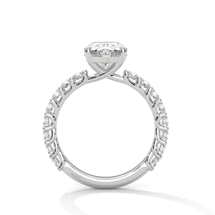 A white gold engagement ring with a diamond center in a bubble setting, crafted from 14k gold and featuring an oval shape.