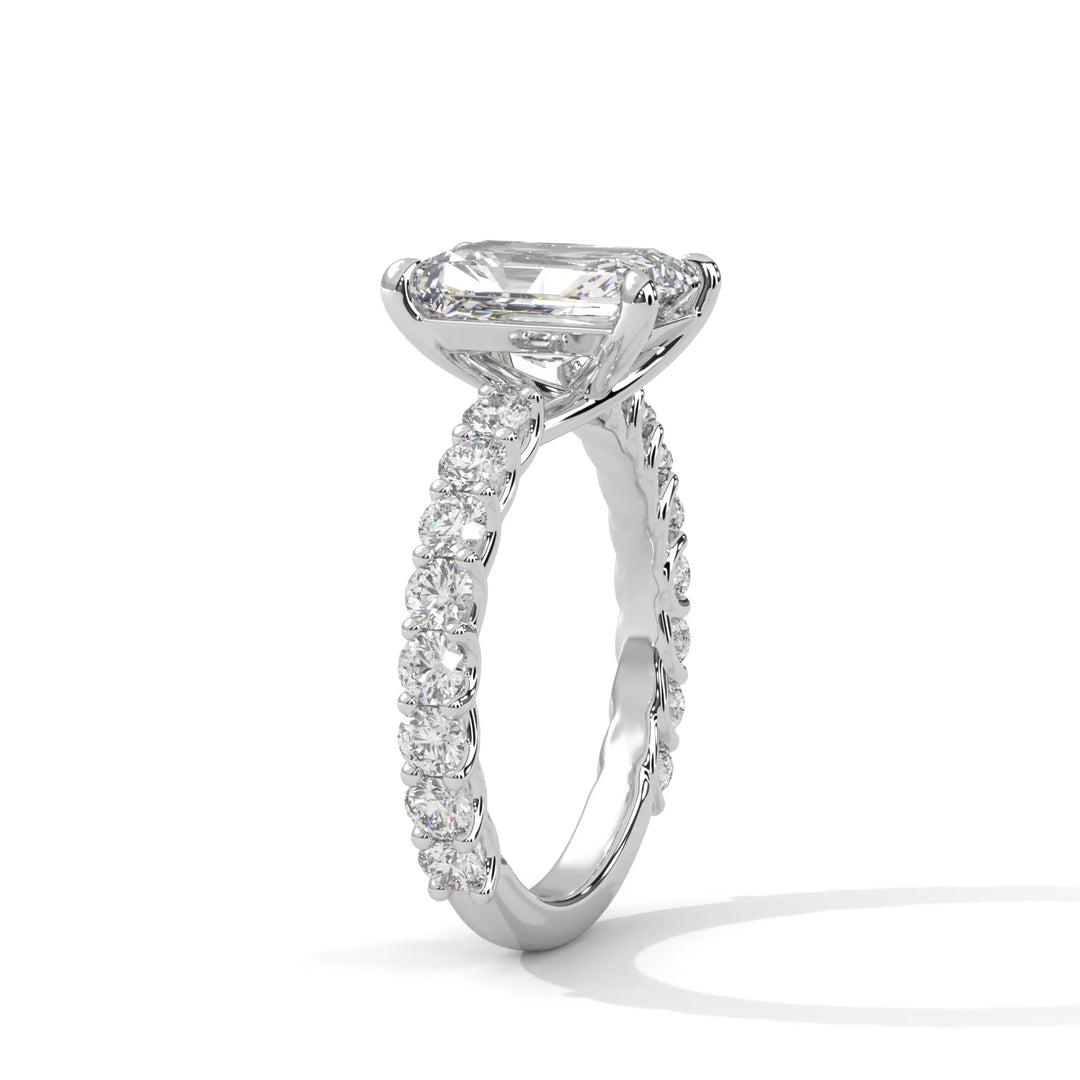 An elegant radiant diamond engagement ring crafted in 14k white gold, highlighted by a bubble setting for a captivating 3D appearance.