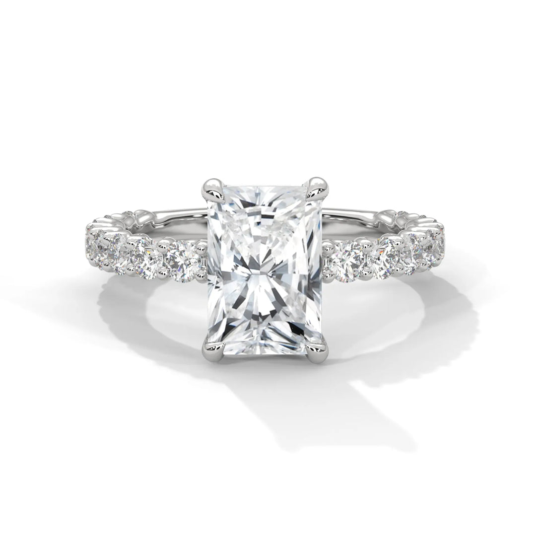 A stunning radiant cut diamond engagement ring in a bubble setting, crafted from 14k white gold for a luxurious touch.