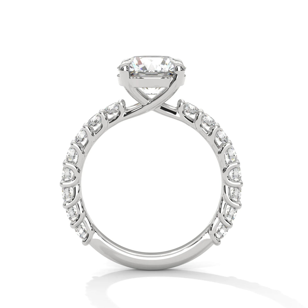 A white gold engagement ring with a diamond center in a bubble setting, crafted from 14k gold and featuring an round shape.