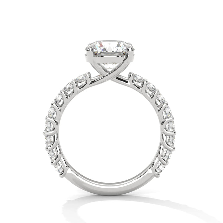 A white gold engagement ring with a diamond center in a bubble setting, crafted from 14k gold and featuring an round shape.