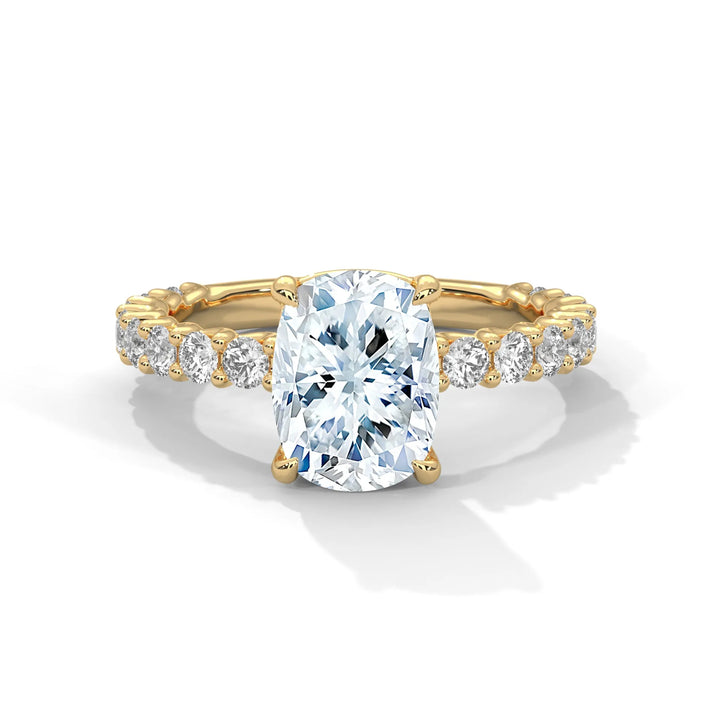 A stunning long cushion cut diamond engagement ring in a bubble setting, crafted from 14k yellow gold for a luxurious touch.