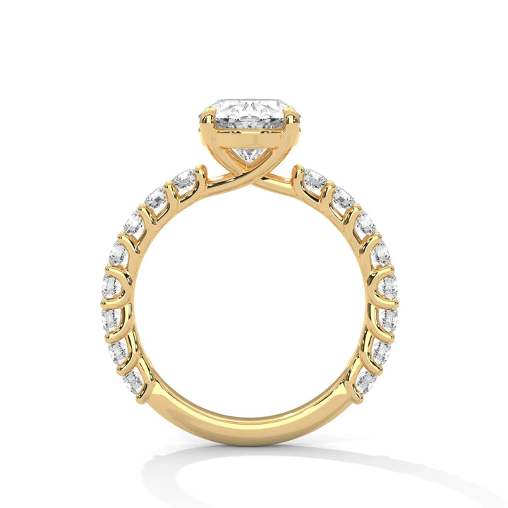 A yellow gold engagement ring with a diamond center in a bubble setting, crafted from 14k gold and featuring an oval shape.