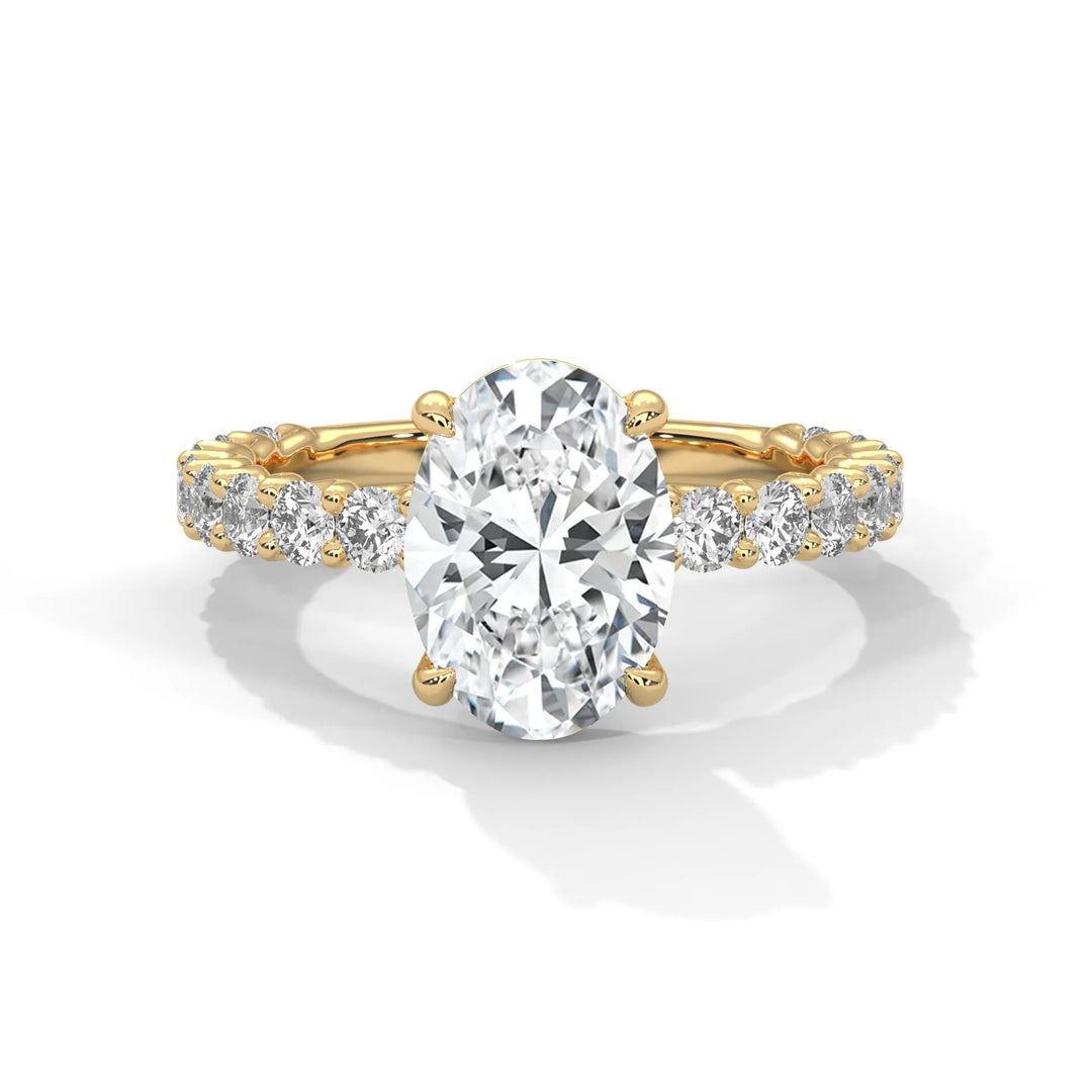 A stunning oval cut diamond engagement ring in a bubble setting, crafted from 14k yellow gold for a luxurious touch.