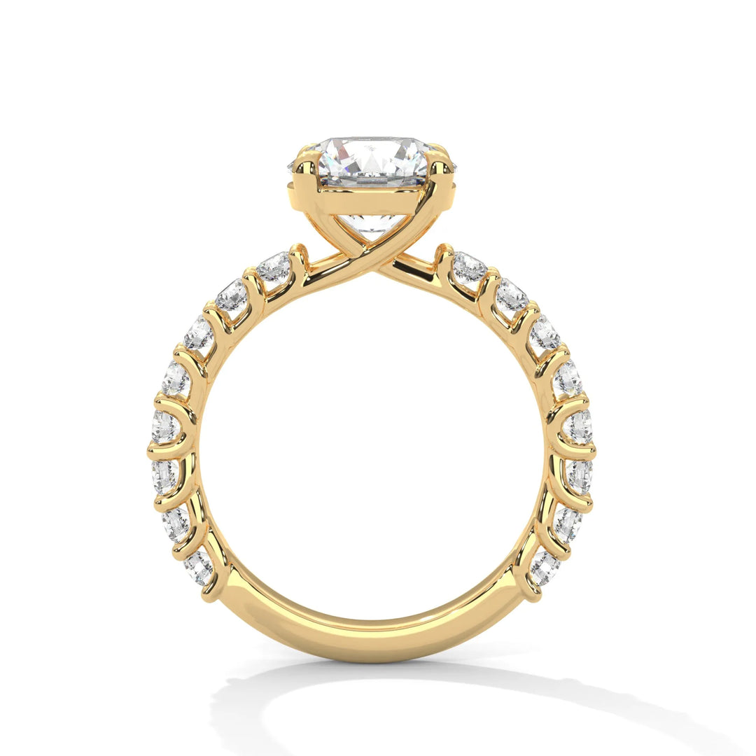 A yellow gold engagement ring with a diamond center in a bubble setting, crafted from 14k gold and featuring an round shape.