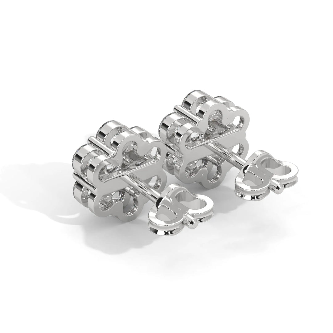 Chrome dumbbell set on a white background.