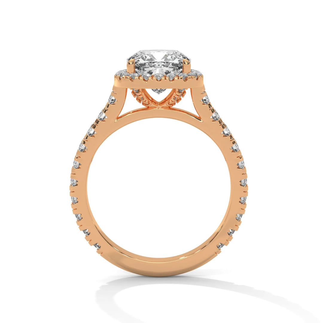 A stunning 14K rose gold engagement ring adorned with a Crystal Setting of diamonds, showcasing exquisite craftsmanship and elegance.