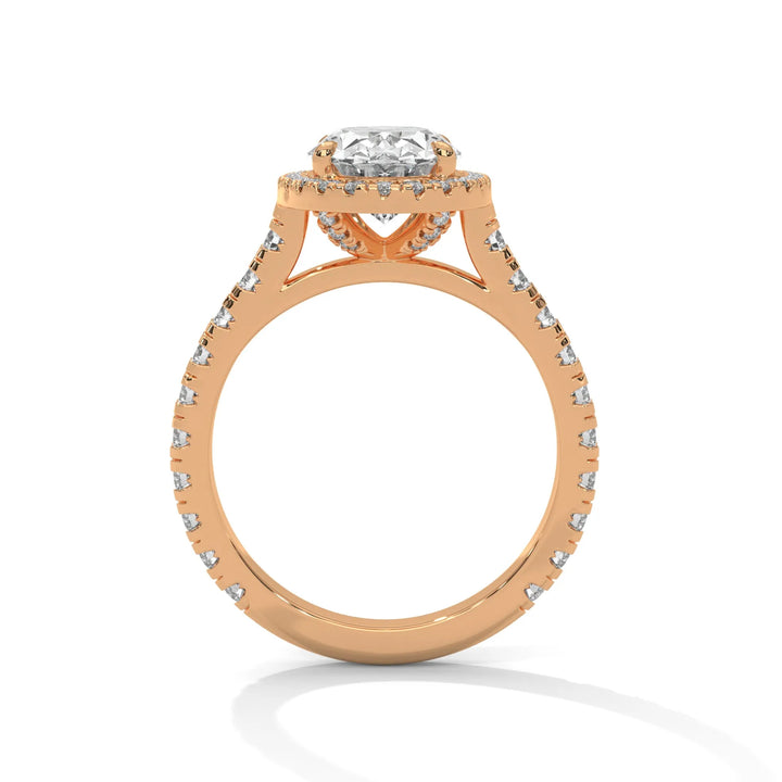 A stunning 14K rose gold engagement ring adorned with a Crystal Setting of diamonds, showcasing exquisite craftsmanship and elegance.