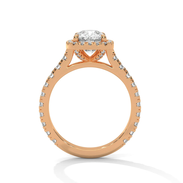 A stunning 14K rose gold engagement ring adorned with a Crystal Setting of diamonds, showcasing exquisite craftsmanship and elegance.