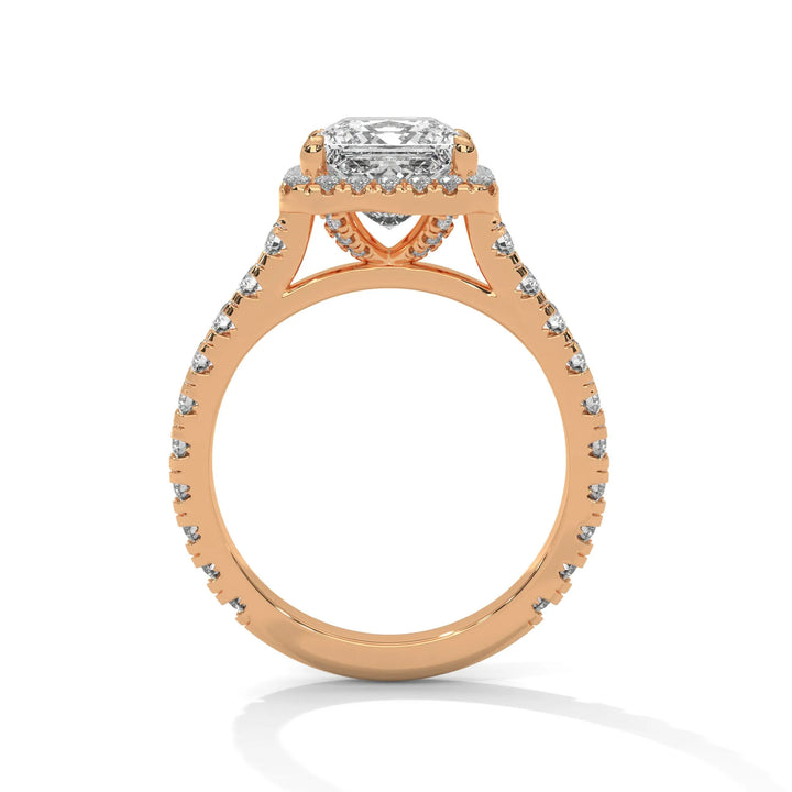 A stunning 14K rose gold engagement ring adorned with a Crystal Setting of diamonds, showcasing exquisite craftsmanship and elegance.