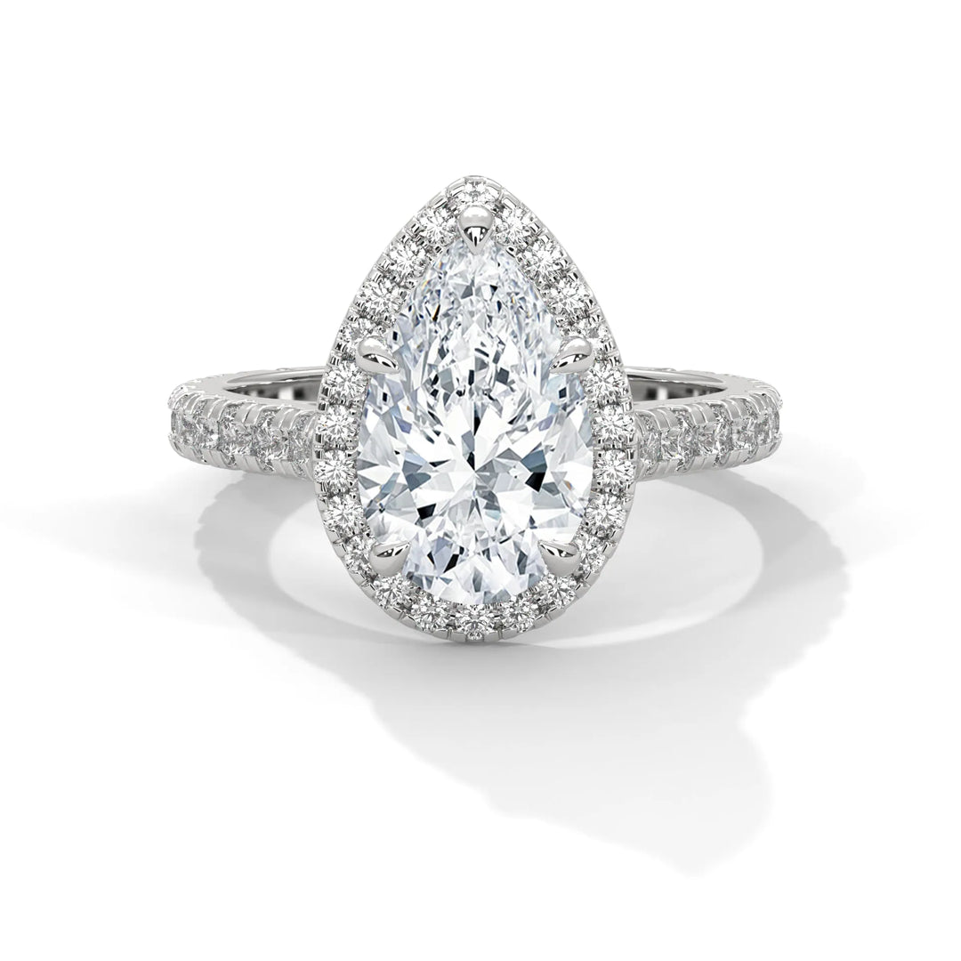 A Crystal Setting diamond set in 14k white gold, this engagement ring radiates sophistication and everlasting love.