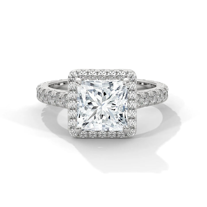 A Crystal Setting diamond set in 14k white gold, this engagement ring radiates sophistication and everlasting love.