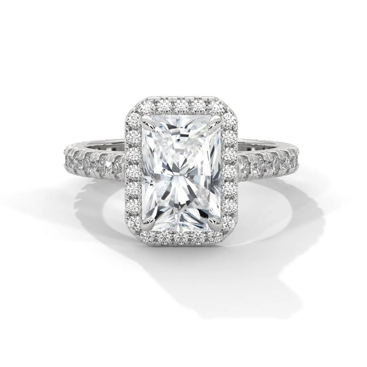 A Crystal Setting diamond set in 14k white gold, this engagement ring radiates sophistication and everlasting love.