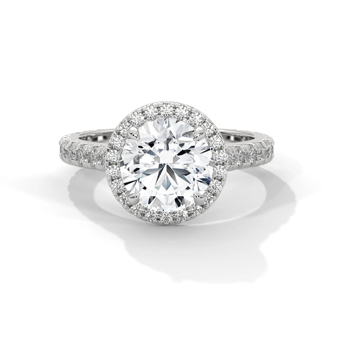 A Crystal Setting diamond set in 14k white gold, this engagement ring radiates sophistication and everlasting love.