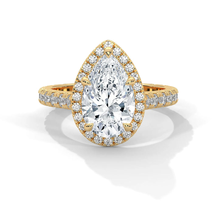 A Crystal Setting diamond set in 14k yellow gold, this engagement ring radiates sophistication and everlasting love.