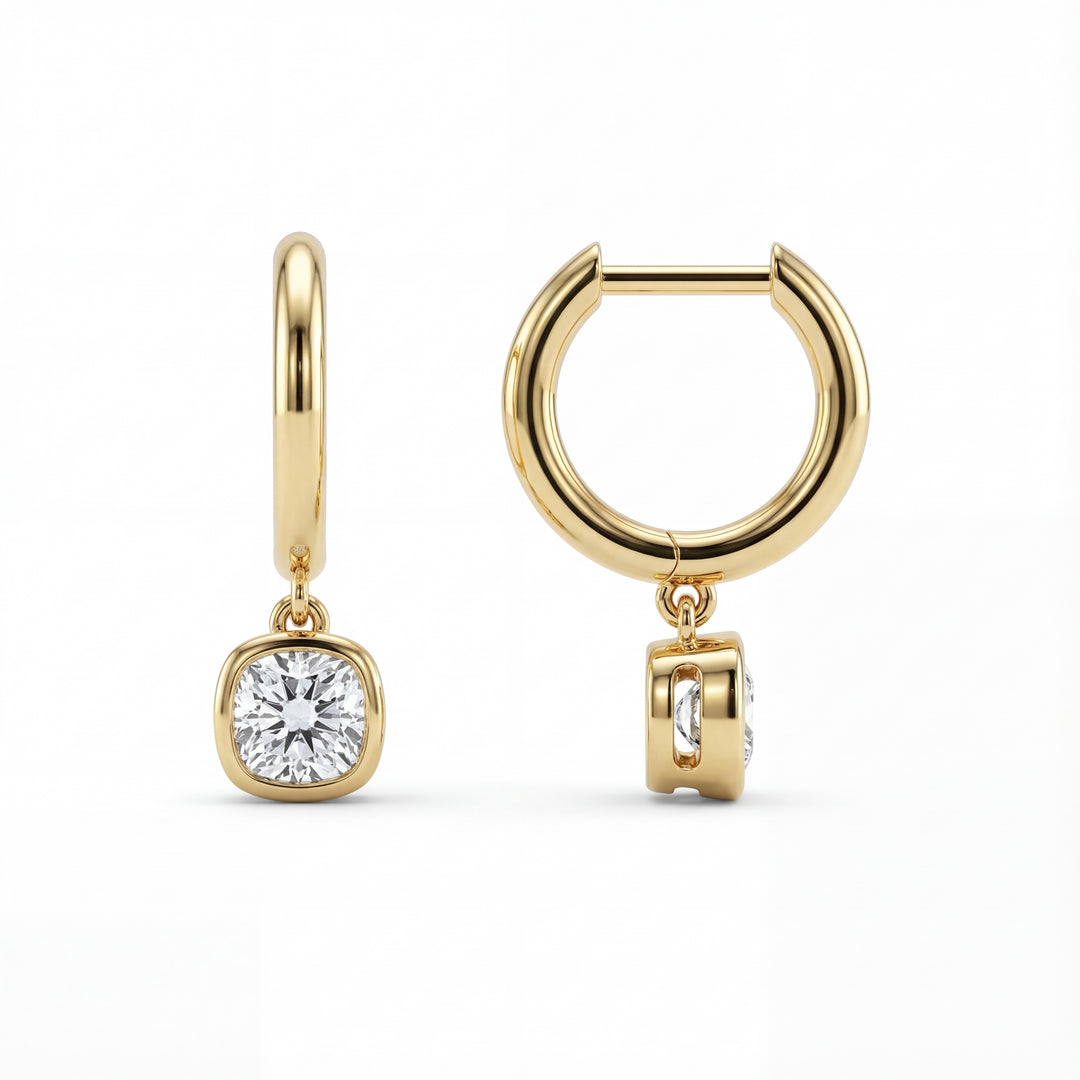 Cushion bezel hoop earrings in gold with diamonds. Minimalist, dainty and elegant earrings.