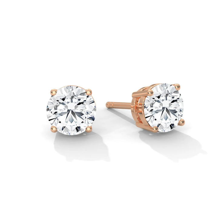 Diamond stud earrings crafted in rose gold showcasing elegance and sophistication in a timeless design.