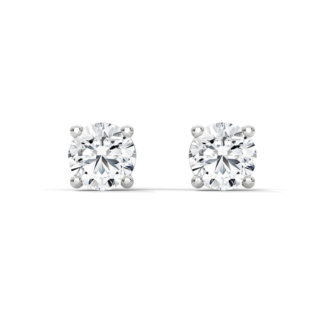 Diamond stud earrings crafted in white gold, showcasing elegance and timeless beauty