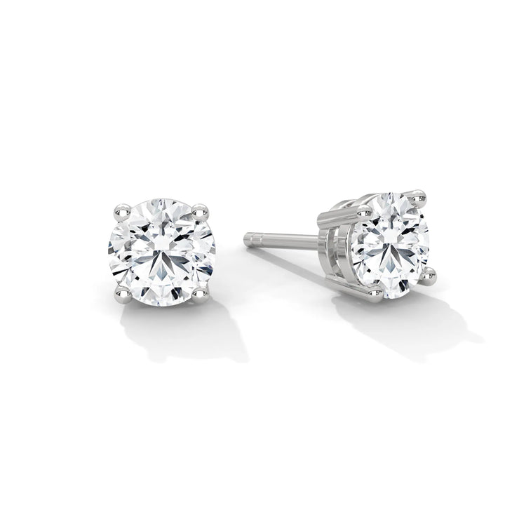 Diamond stud earrings crafted in white gold showcasing a timeless elegance and sparkling brilliance.