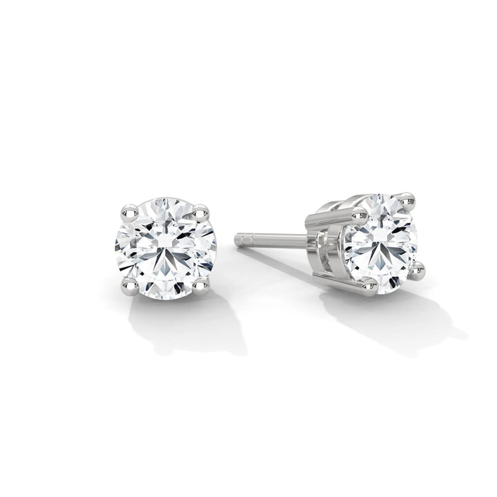 Diamond stud earrings crafted in white gold sparkling elegantly and perfect for any occasion.