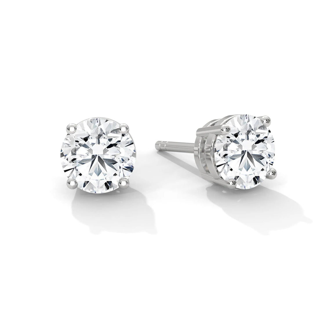 Diamond stud earrings crafted in white gold sparkling elegantly and perfect for any occasion.