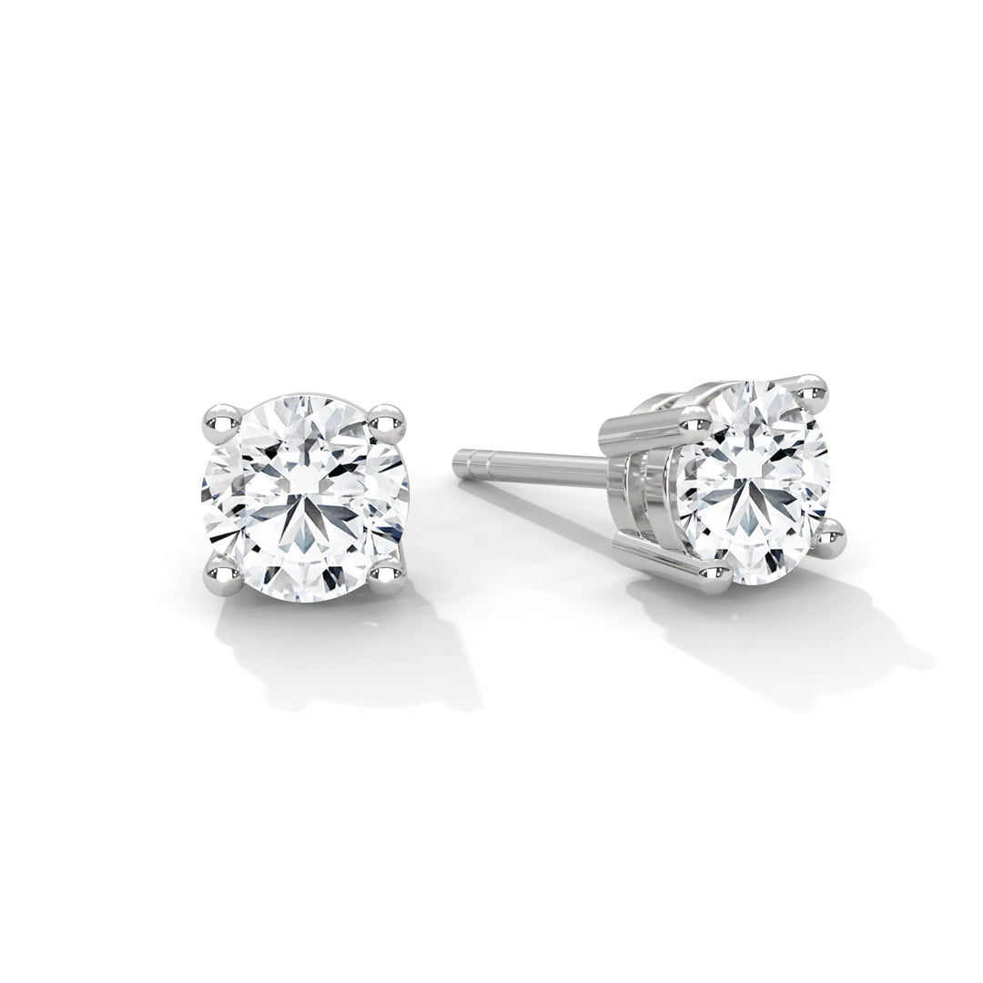 Diamond stud earrings crafted in white gold showcasing elegance and timeless beauty in a refined design.