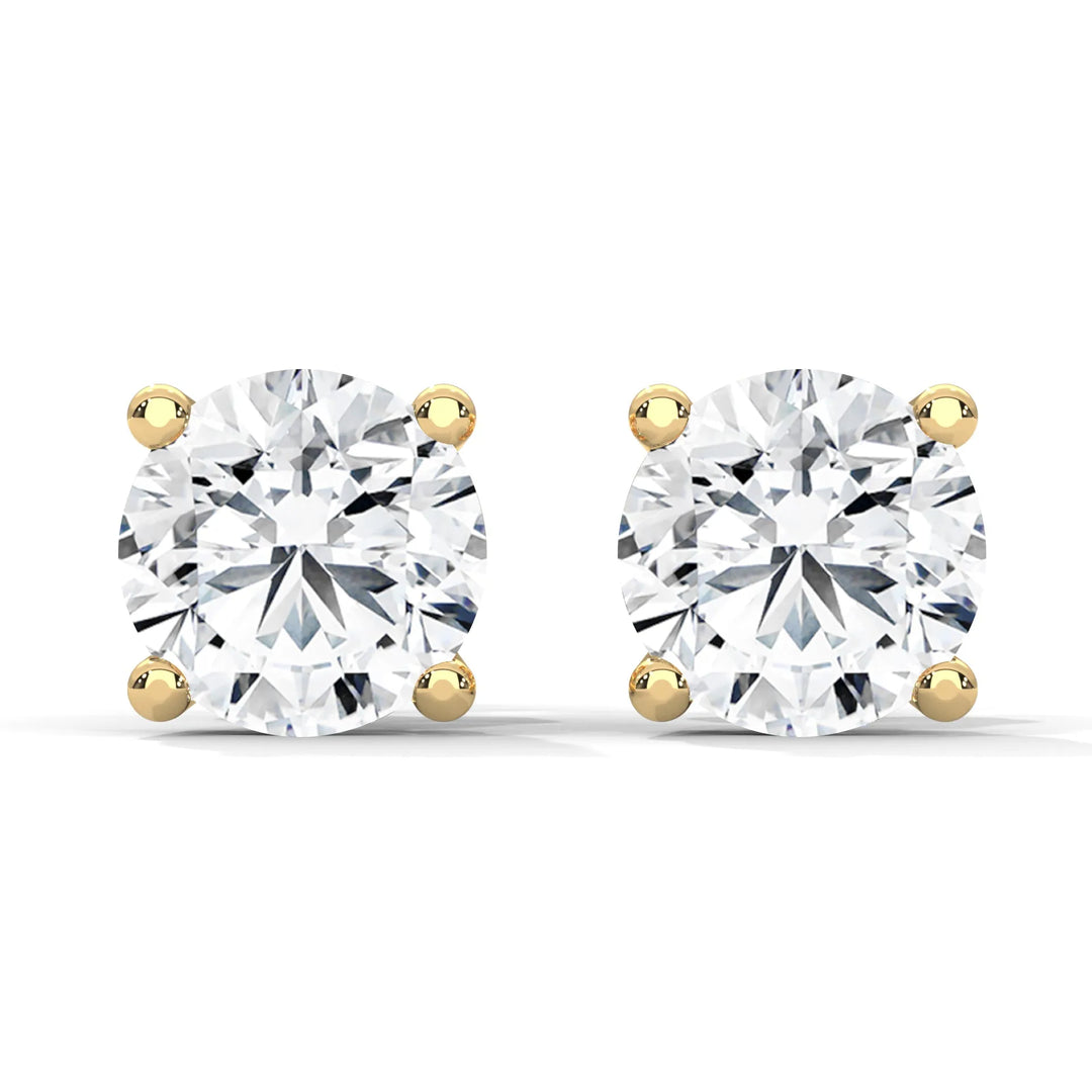 Diamond stud earrings crafted in yellow gold, showcasing elegance and sophistication in a timeless design.