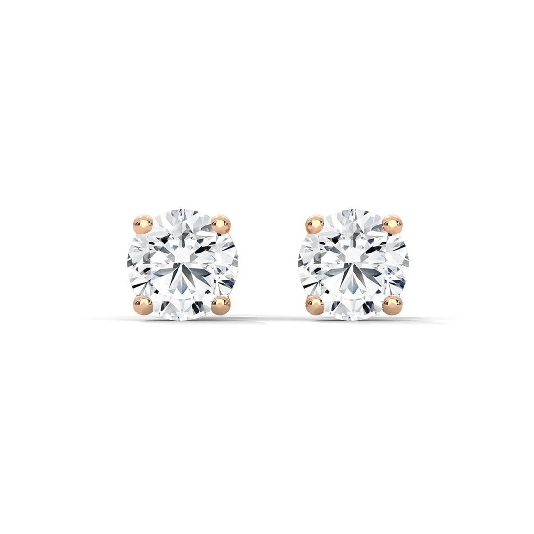 Diamond stud earrings set in white gold showcasing a classic and elegant design perfect for any occasion.