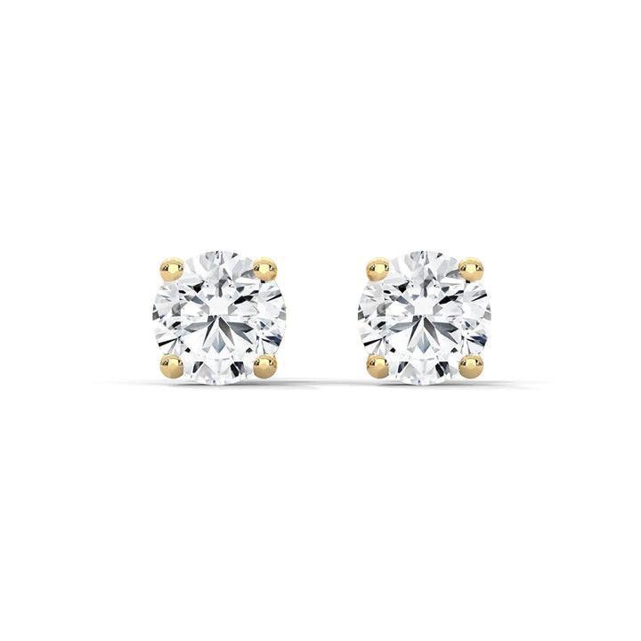 Diamond stud earrings set in yellow gold showcasing a classic and elegant design perfect for any occasion.