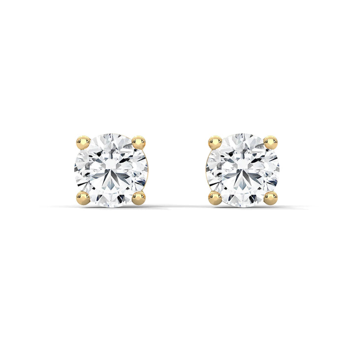 Diamond stud earrings set in yellow gold sparkling and elegant perfect for adding a touch of luxury to any outfit.